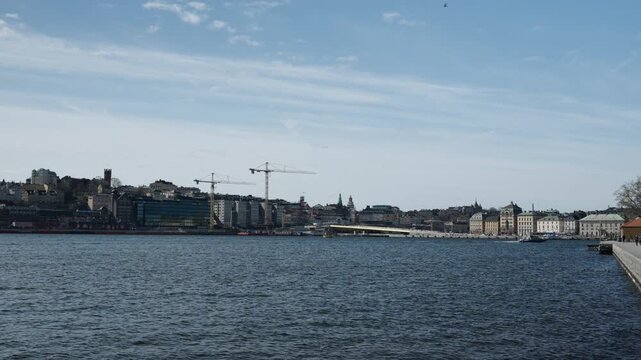 Footage of downtown Stockholm, with slussen golden bridge