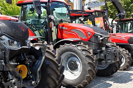 Case IH red tractors lined up showing powerful agriculture machinery