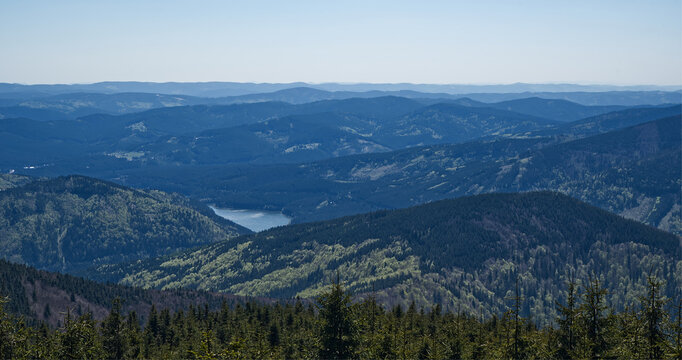 Sance dam with hills around from hiking trail bellow Lysa hora hill summit in Moravskoslezske Beskydy mountains in Czech republic