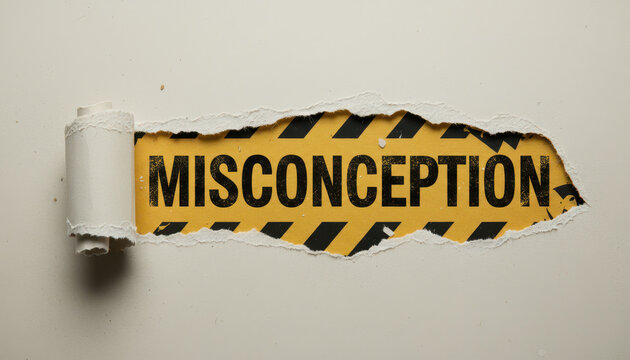 Torn Paper Revealing Misconception Under Cautionary Markings