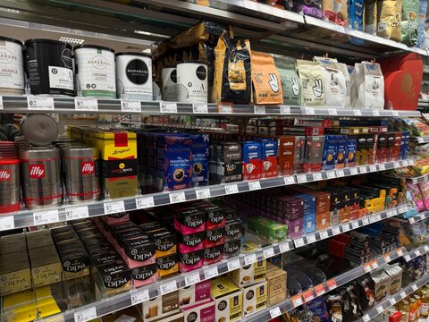 Palma, spain, may 2, 2026, coffee variety on supermarket shelves featuring different brands, products, and prices in a grocery store aisle