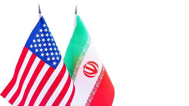 Flags of America and Iran close up isolated on background. Trade intensions between US and Iran concept.