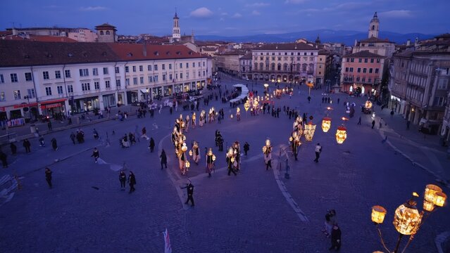 Evening Procession with Lanterns Illuminates Historic City Square - Festive Celebration, Cultural Event, Community Gathering