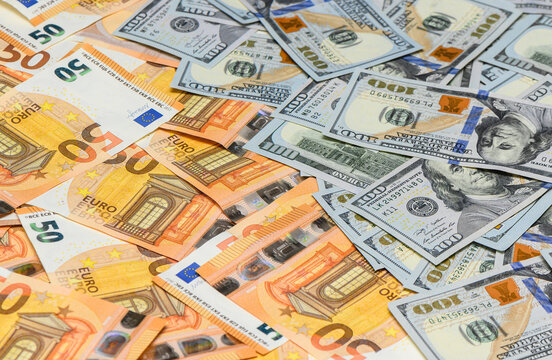 US dollar and euro notes background with cryptocurrency finance theme