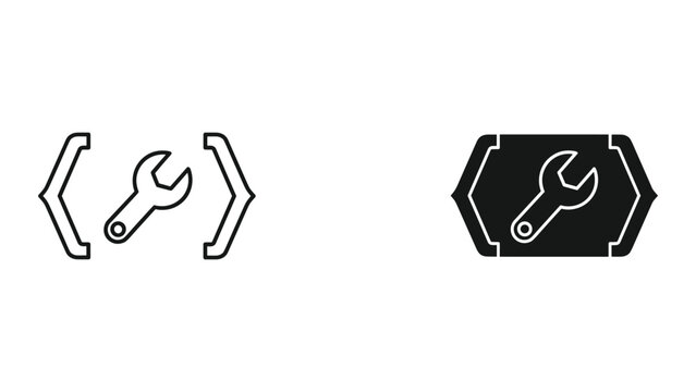 Black and white icons of a wrench with code and label symbols on a white background