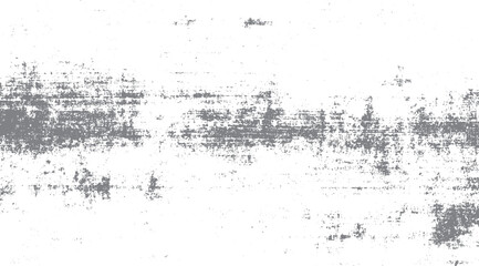 Fototapeta premium Abstract distressed grunge texture with scattered grey speckles and smudges on white background