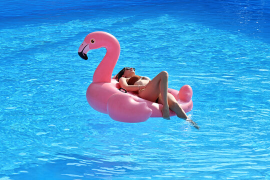 Beautiful woman in the swimming pool