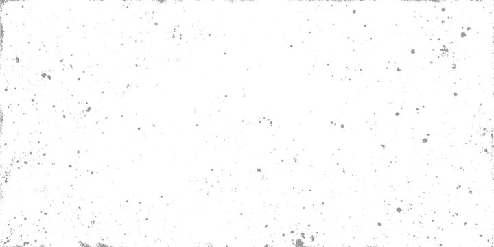Scattered grey dust specks and grunge texture on a white background speckle