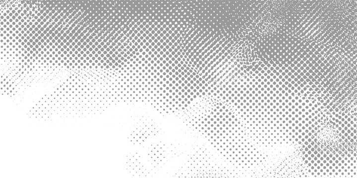Grey halftone dot pattern with fading density and textured edges on white background dots
