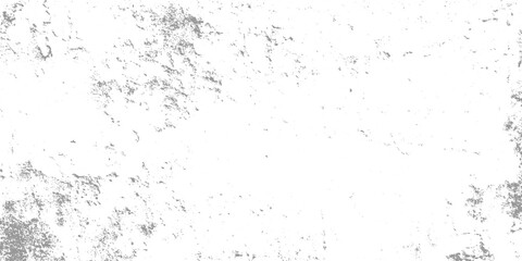 Fototapeta premium Textured gray speckles scattered across a white background creating a distressed grunge effect abstract