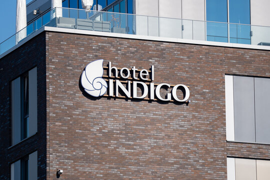Hotel Indigo logo sign. Chain of hotels owned by IHG InterContinental Hotels Group on April 21, 2026 in Berlin, Germany.