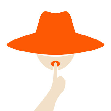 A woman wearing a large orange hat covering her face with her finger to her lips in a gesture of silence or secrecy