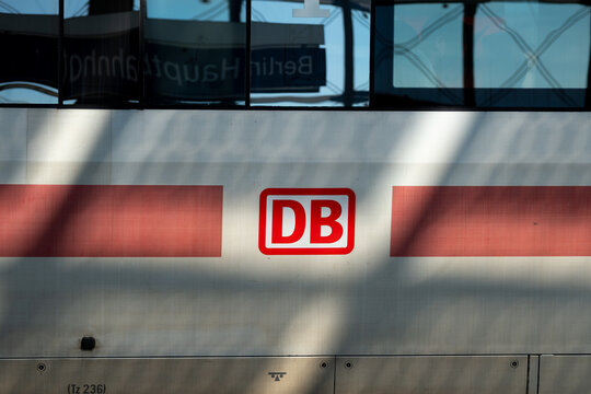 DB Deutsche Bahn logo sign on a train. German national railway company logotype, provider of rail transport and infrastructure in Germany on April 21, 2026 in Berlin, Germany.