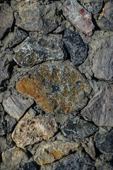 Fototapeta premium Grey stone wall texture background, vertical