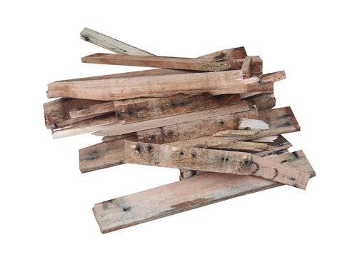 Pile of broken wooden planks and timber scraps