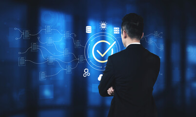 A businessman stands in a modern office environment, analyzing data insights displayed on a high-tech interface, highlighting innovation, strategy, and decision-making. Cyphers © InfiniteFlow