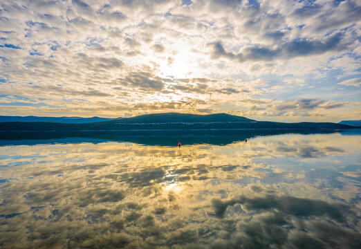 Golden Sunset Reflection Over Calm Adriatic Sea in Neum