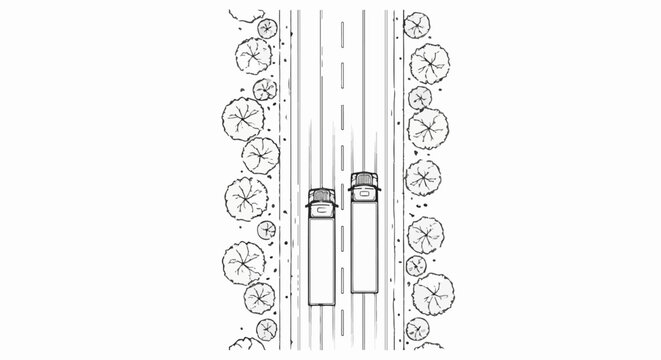 Top-down view of two trucks on a divided highway surrounded by trees