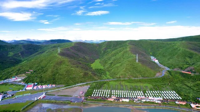 4K Aerial photography of natural scenery of mountain peaks and grasslands after rain in western Sichuan