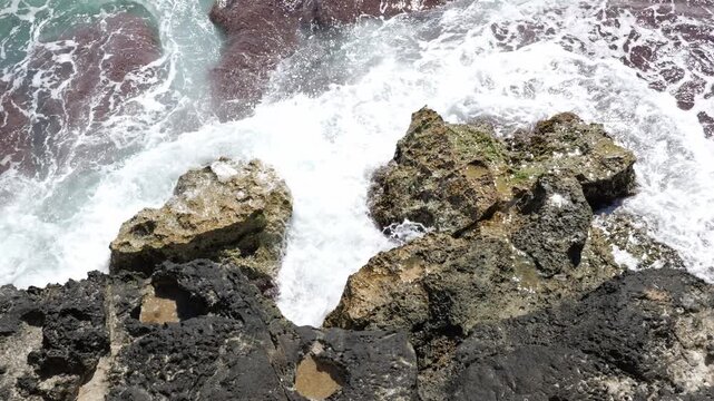 Powerful waves move across a rugged rocky coastline in Cala Blava, Mallorca. Ideal for travel, nature or background footage with vivid mood. 4K UHD (3840x2160), 25fps, 56 seconds, 816 MB.
