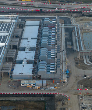 Aerial view of a hyperscale data center featuring cooling units, solar panels and industrial infrastructure Netherlands.