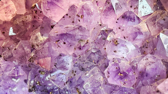 purple amethyst close up facets background
