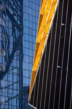 Close framing in paris la defense reveals architecture detail with glass contrast lines and pattern shaped into abstract geometry forms
