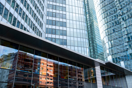 Framed by paris la defense this urban architecture office uses glass reflections pattern and abstract geometry for a polished city feel