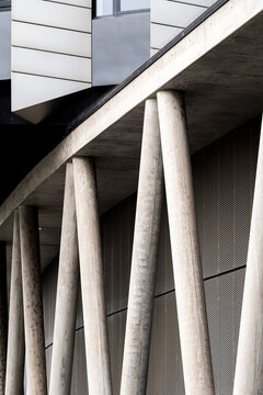 Concrete columns define architecture structure as angles and lines reveal modern texture for abstract background used in minimalist design layouts