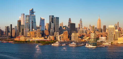 Aerial New York City view of the Midtown Manhattan skyline, with Hudson Yards skyscrapers, Hudson River waterfront and Chelsea piers © Francois Roux
