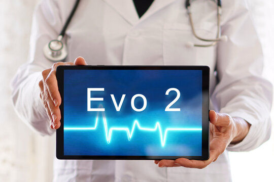 EVO 2. Healthcare professional showing a digital tablet. Medicine and artificial intelligence concept.