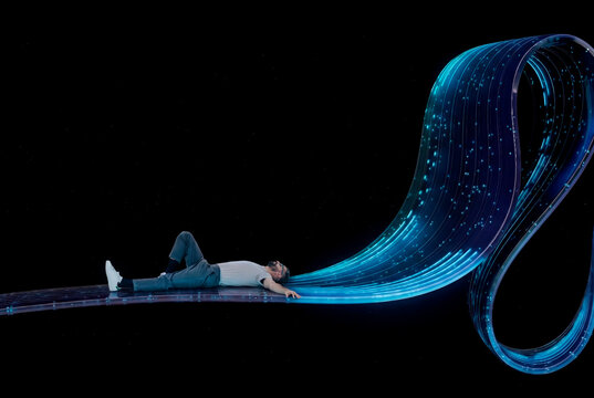 Man lying on flowing 3D data stream with glowing digital particles in abstract space