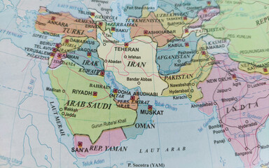 Naklejka premium A world map of West Asia printed in Indonesian language, showing countries in the Middle East and Arabian Peninsula with Iran located in the center, for education, geography, and traveling concepts.