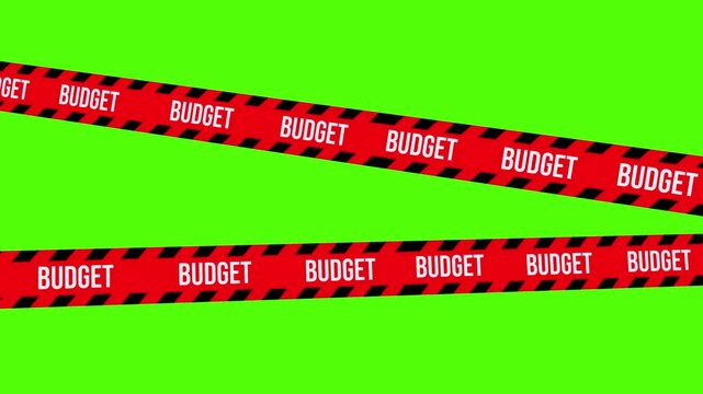Budget Alert: Bold red tape marked with the word budget stretches across a vibrant green backdrop, creating a striking visual, warning about financial limitations.