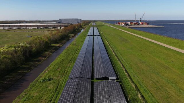 Aerial view of solar panels powering industrial area