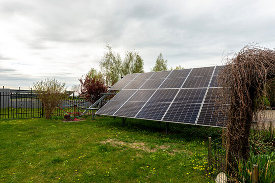 Photovoltaic panels generating clean energy in a poland garden
