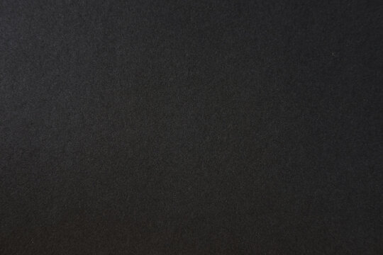 Black paper texture background. Black blank page