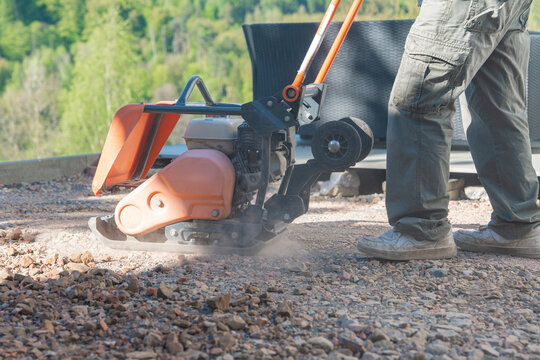 Compactor creating dust cloud