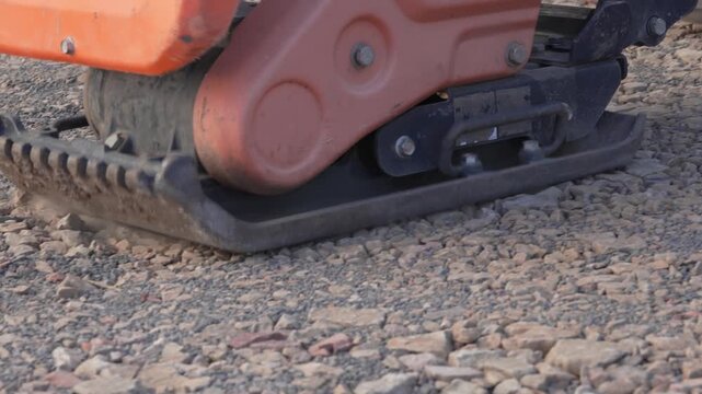 Compactor edge on gravel