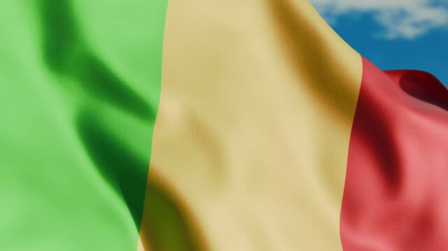 Mali flag waving in wind close up, against the background of the sky with clouds, 4K video render