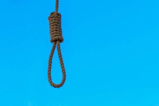 Halloween noose on blue background