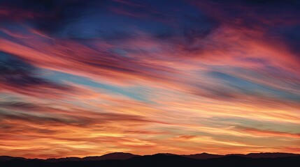 Fototapeta premium Sunset colors blend into evening sky.