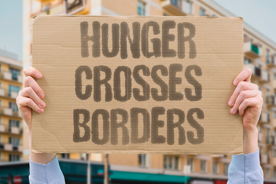 "Hunger Crosses Borders" Economic desperation and food insecurity are primary documented drivers of cross-border migration globally. BORDER. MIGRANT. HUNGER. ECONOMIC. SURVIVAL.