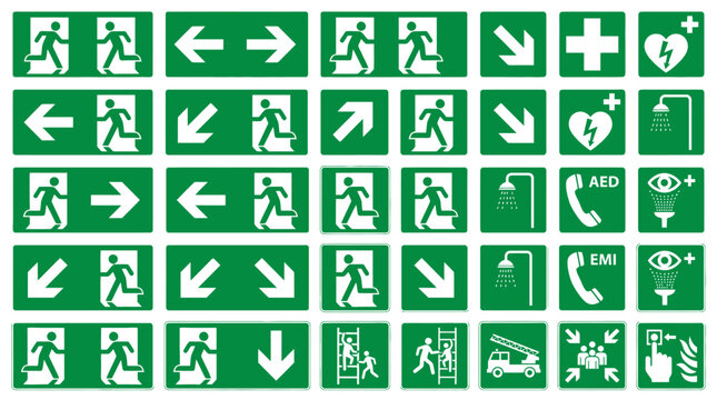 Set of green safety and emergency exit signs.