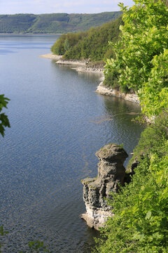 Scenic Dnister River canyon with unique rock formations and lush green vegetation