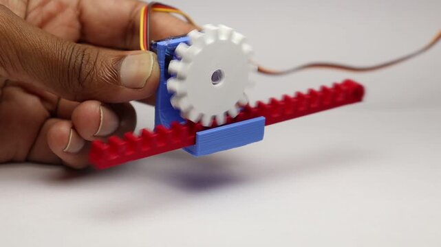 Rack and pinion working shown in close up view. 3D printed mechanisms working