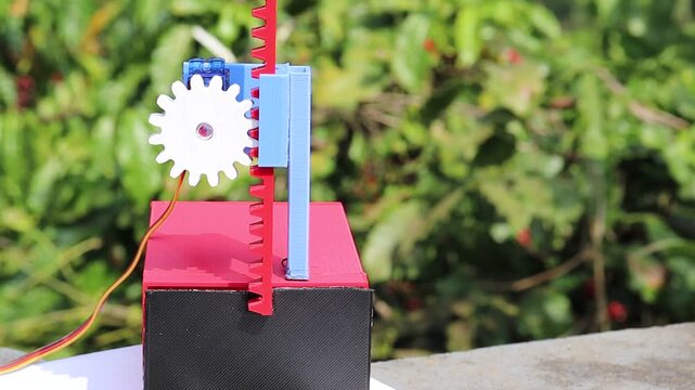 Servo slider mechanism installed on micro servo shaft made using 3d printed parts. Working of mechanism being demonstrated