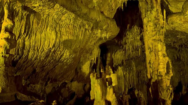 4K video footage of the interior of Ballıca Cave. Stalactites and stalagmites inside the cave. Ballıca, Tokat.