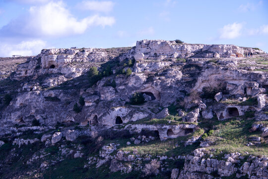 Beyond Matera, the wild ravine of the Gravina di Matera stretches in rugged silence, where wind, rock, and time have carved a stark and ancient landscape.