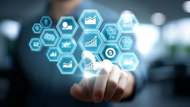 A person touches a transparent virtual screen with various business analytics and data visualization icons. The image represents digital innovation, technology trends, and data driven decision making